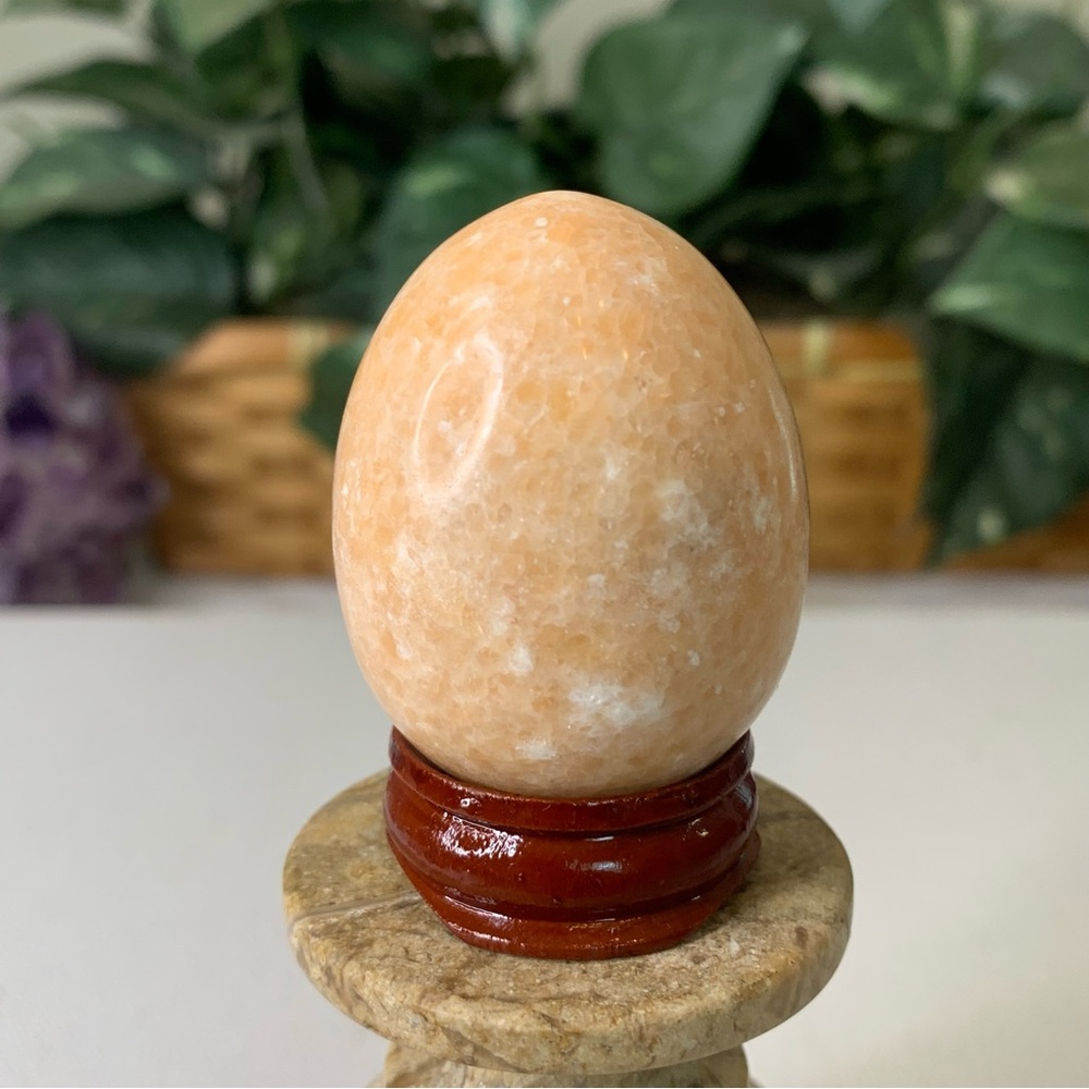 Natural Orange Calcite Egg Polished Crystal Meditation Stone with Wood Stand 2" - Picture 4 of 12